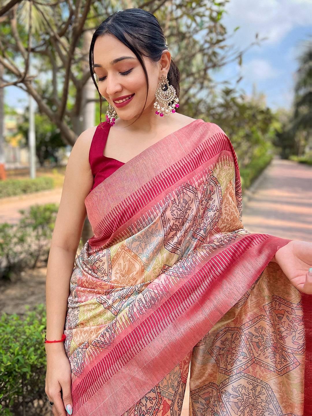 Woman in Madhubani Kalamkari saree showcasing vibrant block prints