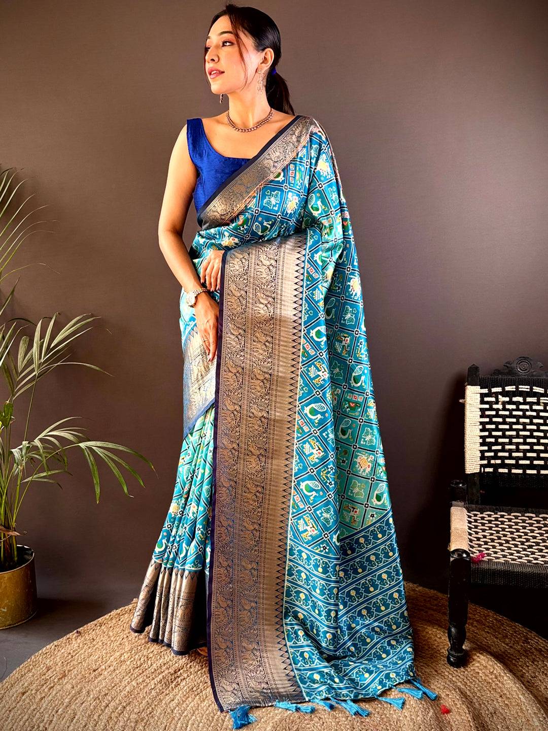 Full view of Ombre Sky Blue Soft Silk Patola Print Saree.