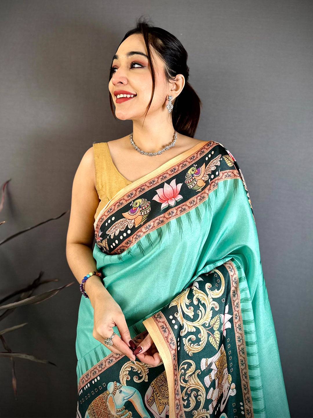 Turquoise Tanjore Elephant Tussar Saree
