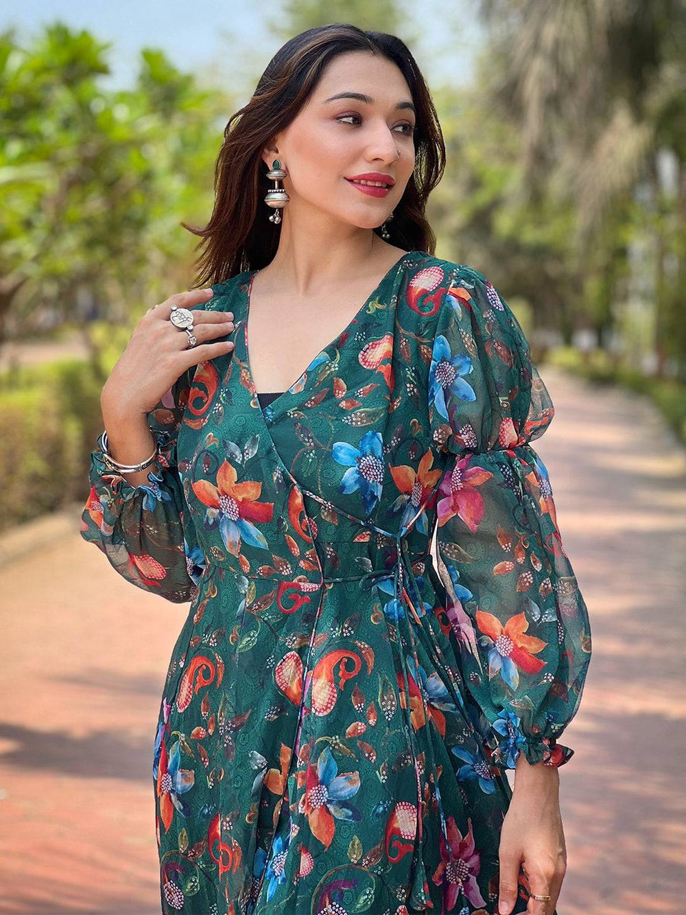 Close-up of floral dark green angarakha dress