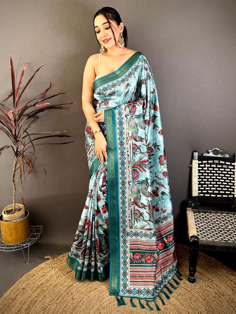 Model wearing Regal Rudrakh digital print soft silk saree with jewelry and accessories