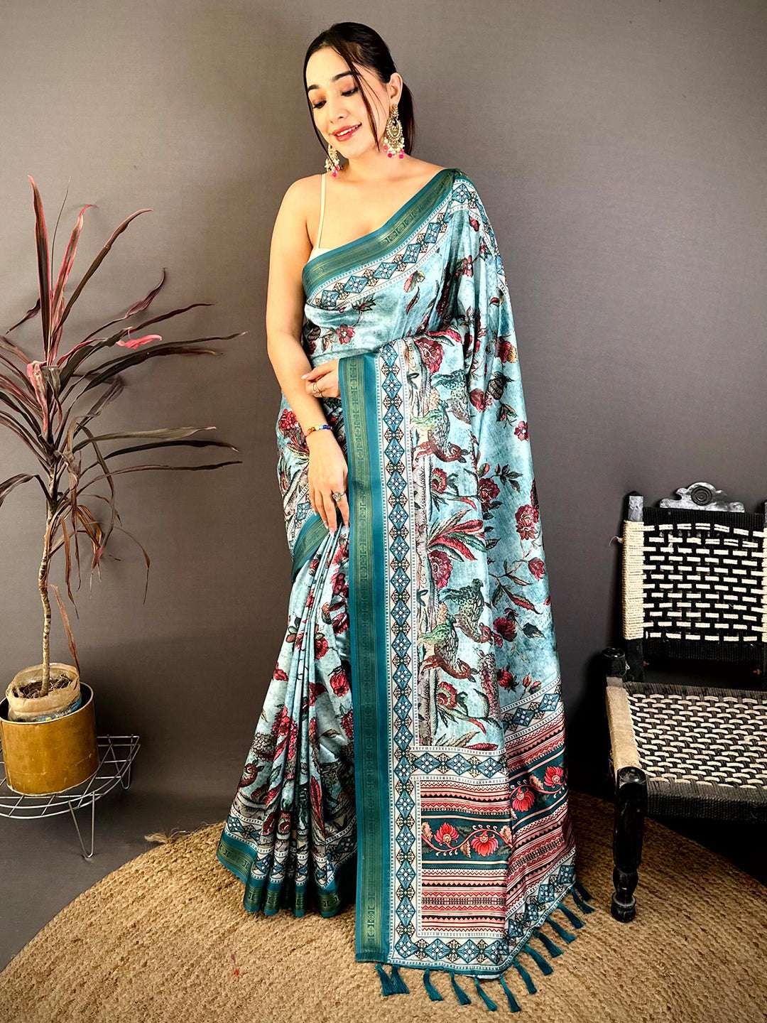 Model wearing Regal Rudrakh digital print soft silk saree with jewelry and accessories
