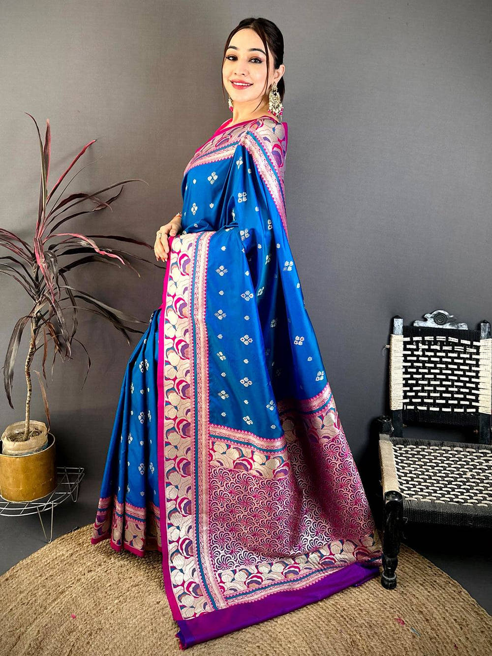 Close-up of Royal Blue Soft Silk Kanjivaram Saree fabric with floral zari embroidery