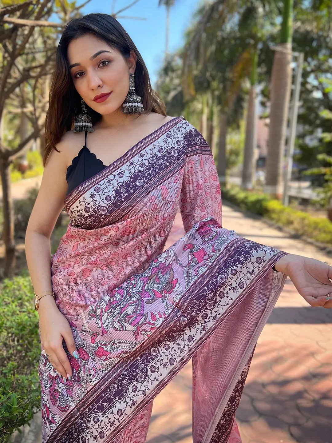 Close-up of pink Kalamkari Satin Kota Doria Saree