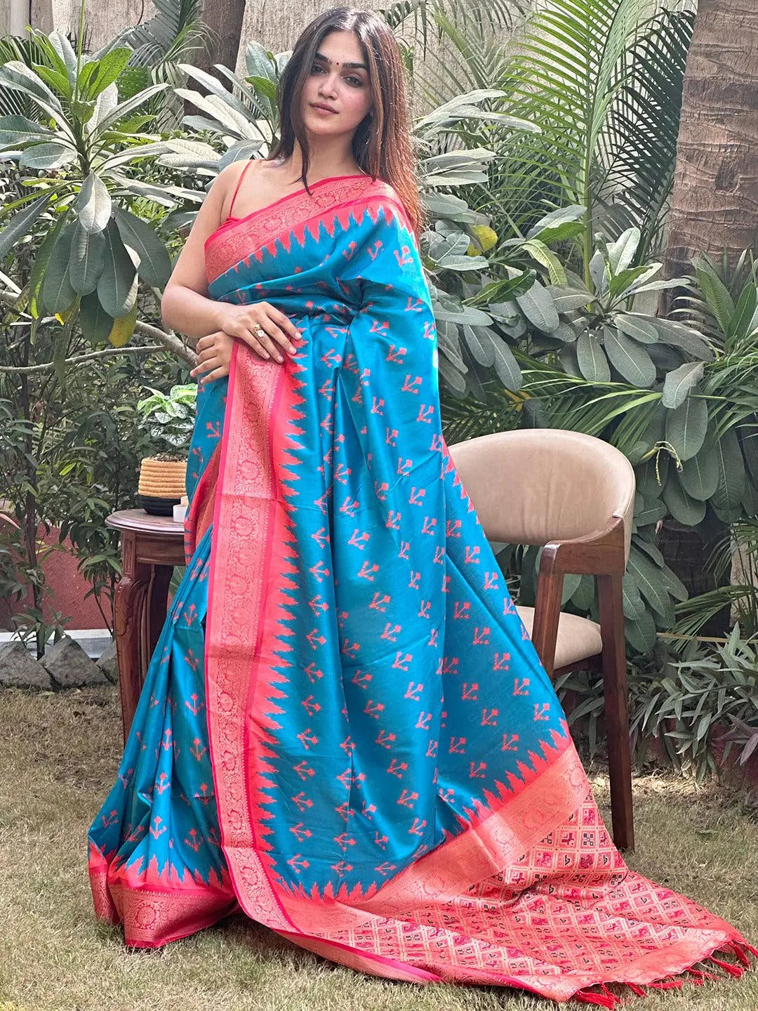 Stylish Banarasi silk saree with intricate red Patola pallu