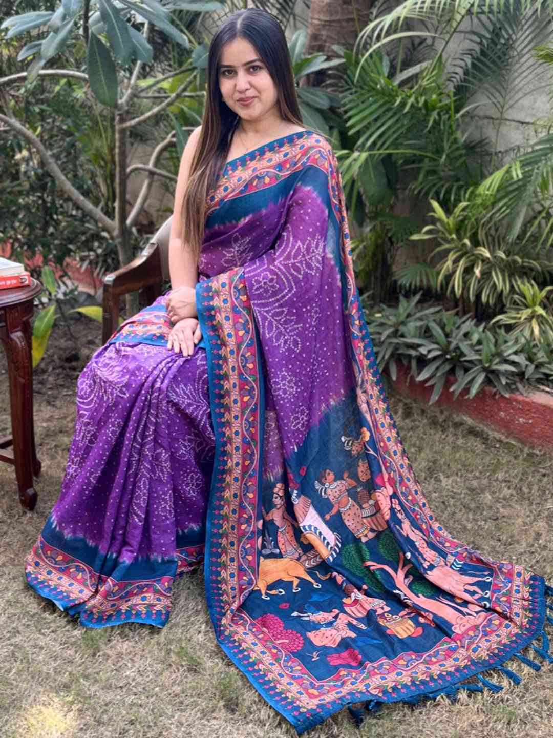 Purple linen saree with Bandhej and Kalamkari print, garden setting