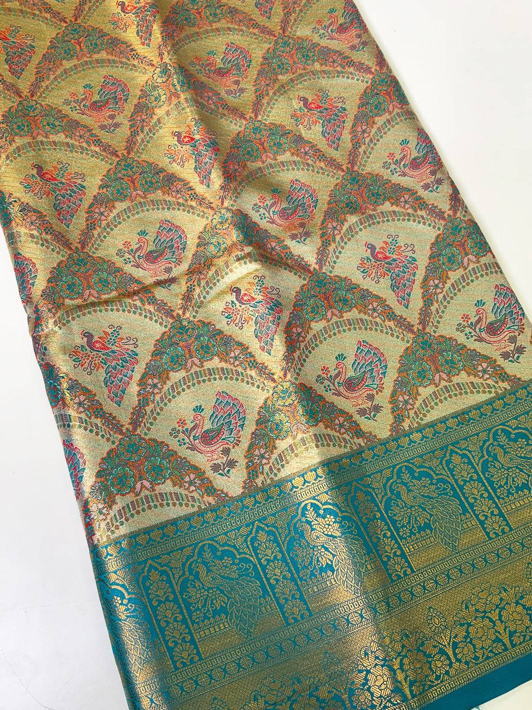 Majestic Rama And Gold Peacock Saree