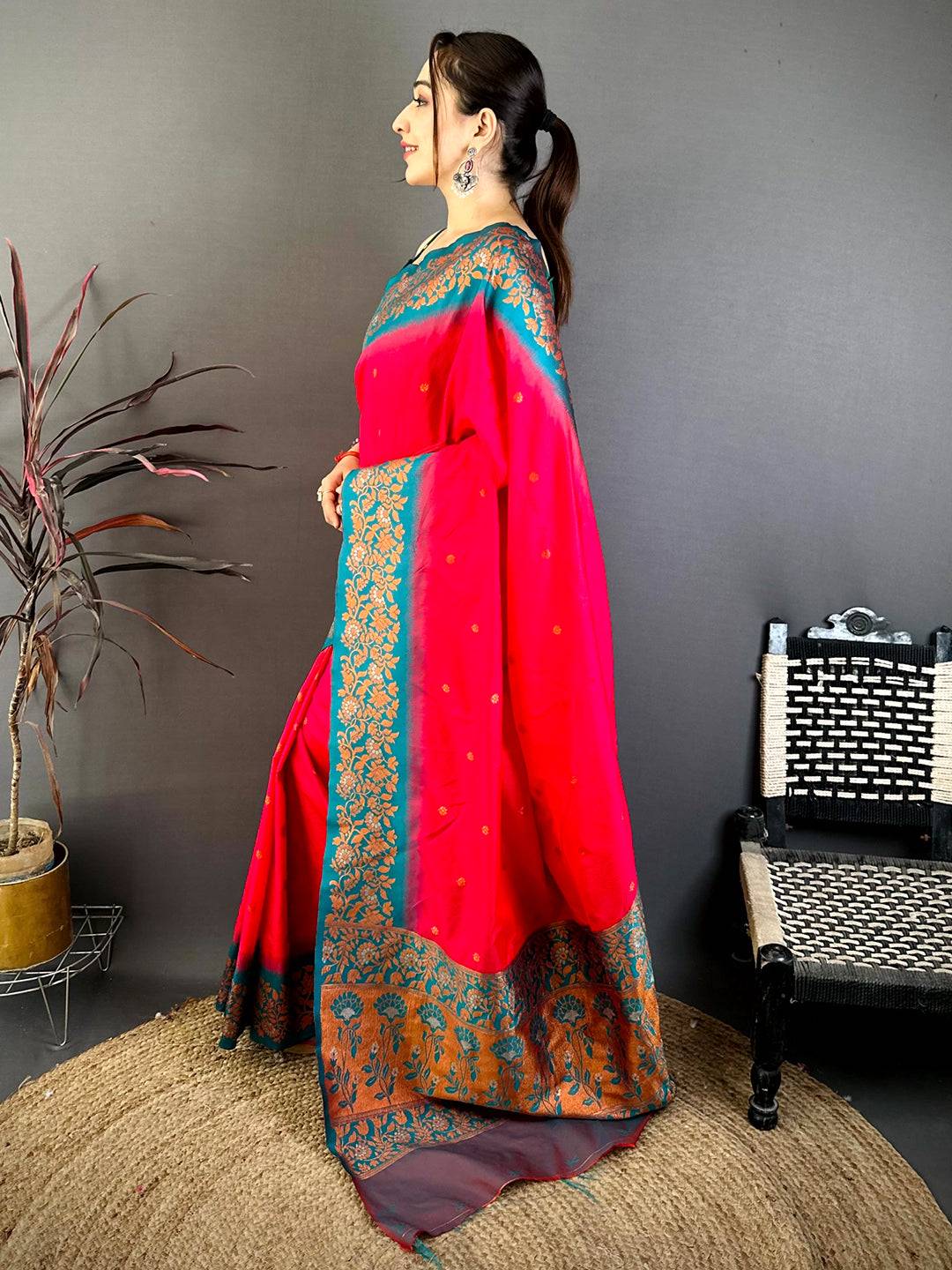 Pink Silk Saree with Gold Floral Border on Green Grass