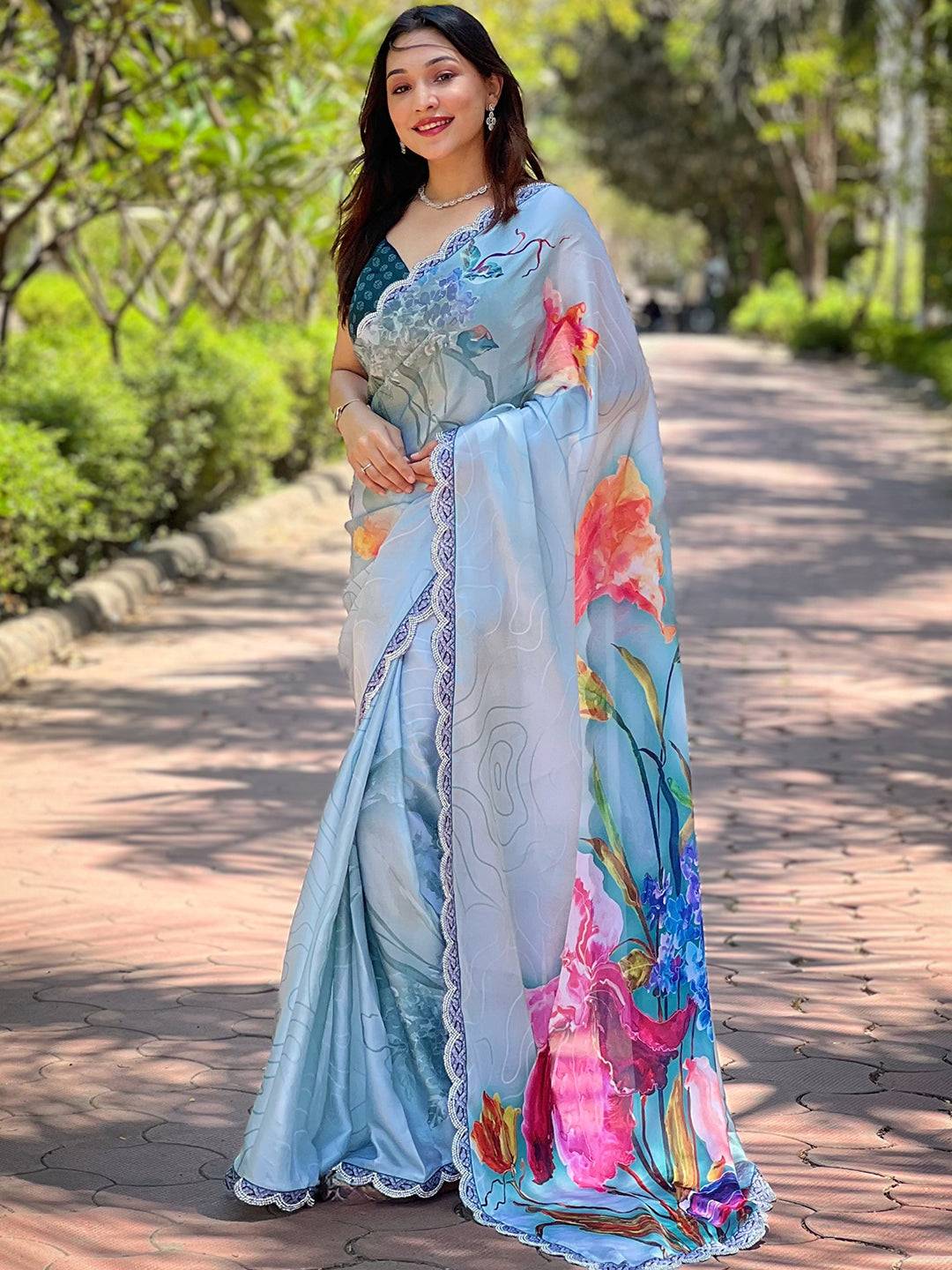 Elegant floral print saree in light blue satin georgette