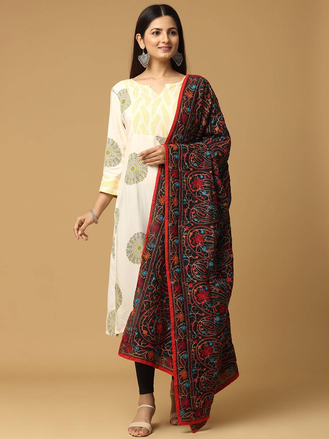 Model wearing black poly chiffon dupatta with vibrant threadwork
