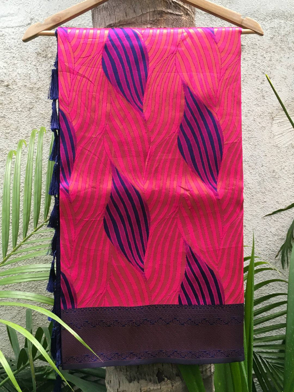 Rani Tussar Silk Ikkat Saree Draped on Hanger