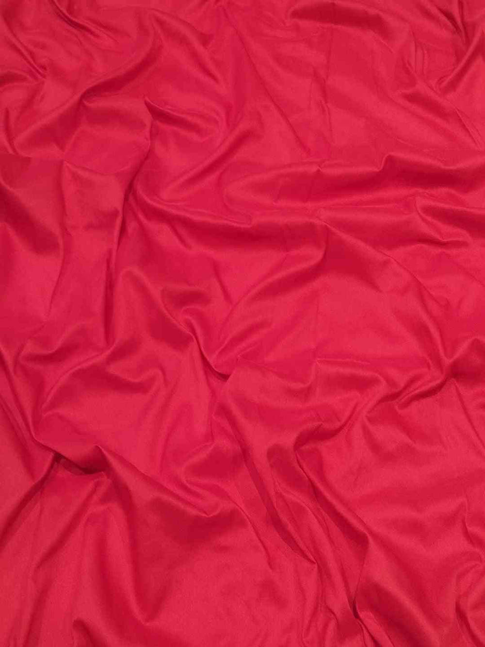 Close-up of red silk fabric texture