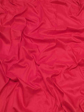 Close-up of red silk fabric texture