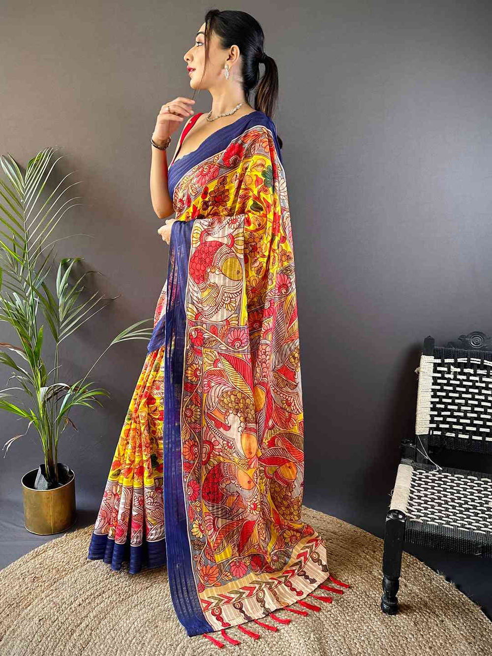 Side view of Sunshine Yellow Pen Kalamkari Linen Saree