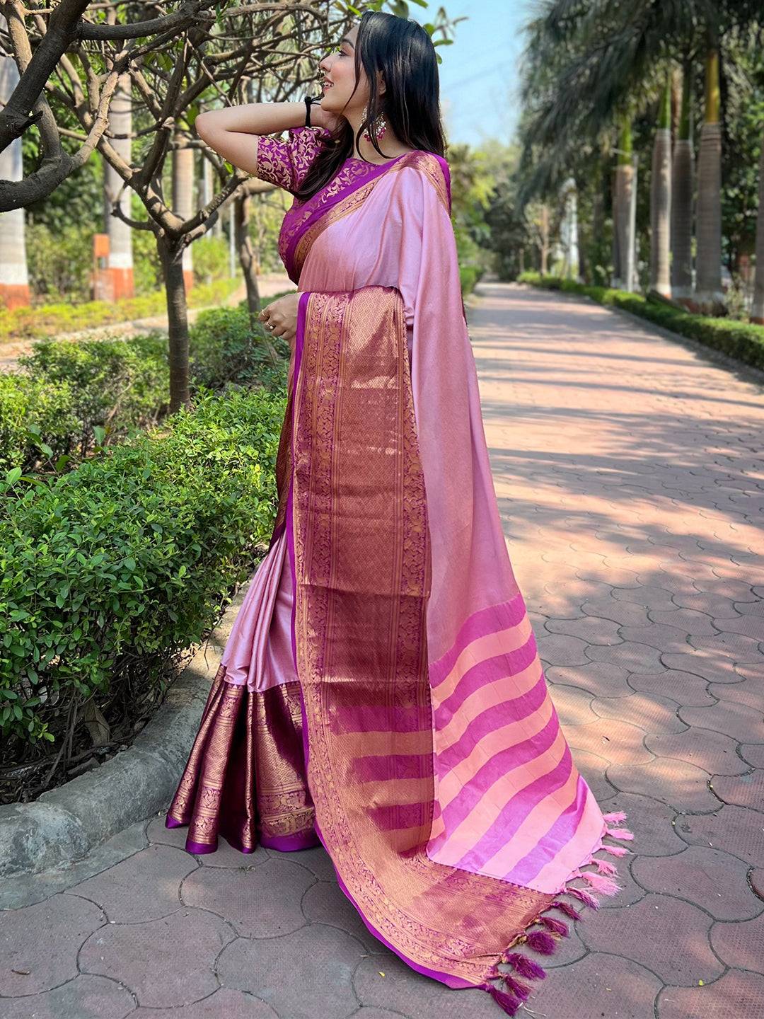 Traditional pink Kanjivaram saree with rich gold patterns