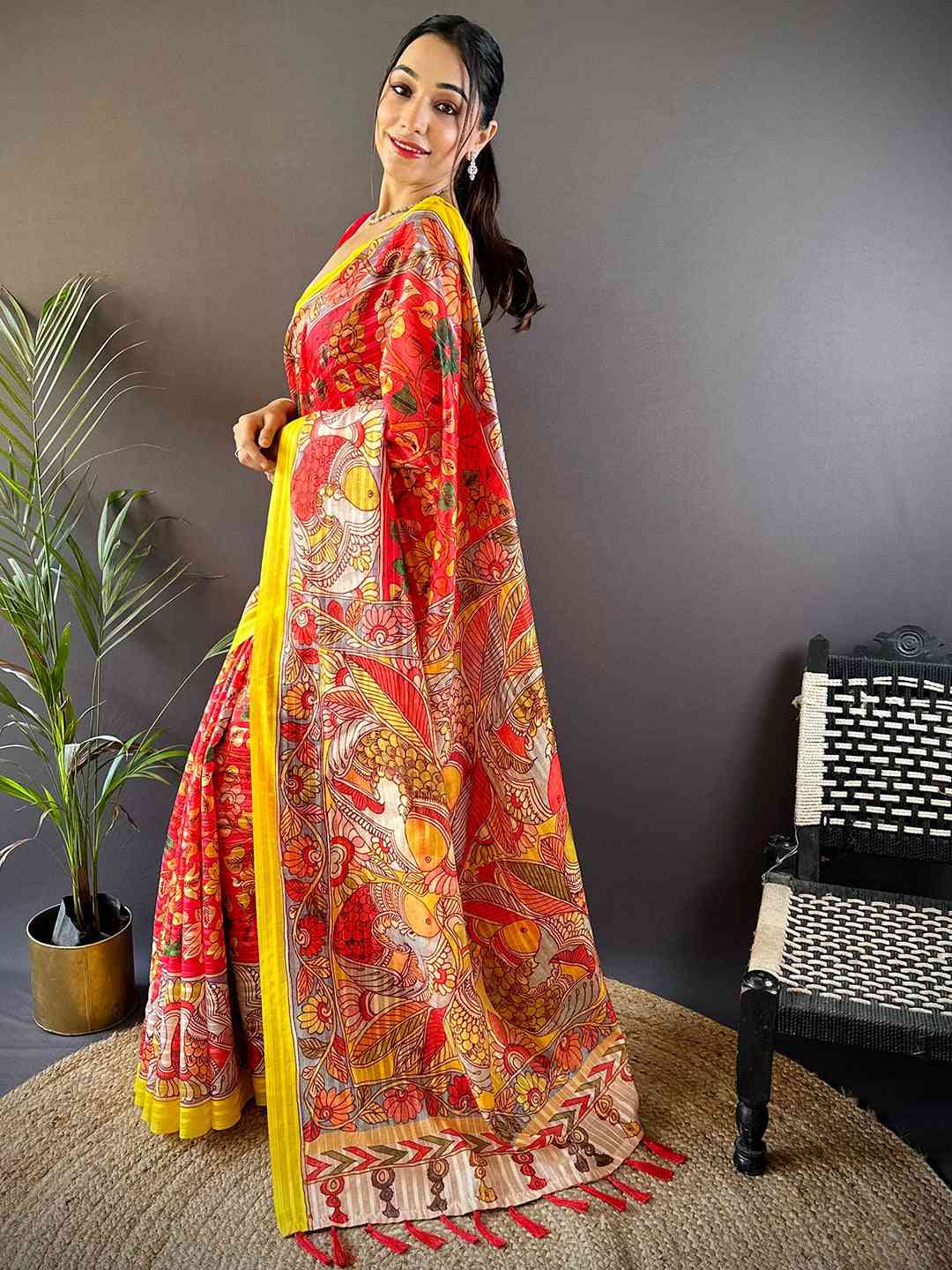 Side view of Rose Red Pen Kalamkari Linen Saree
