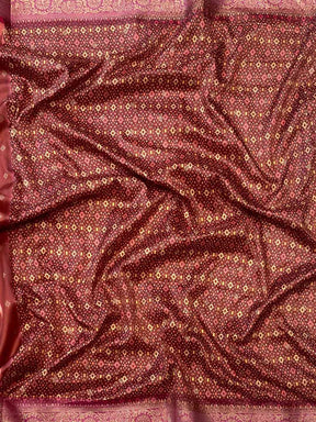 Detailed view of soft silk Banarasi saree with zari patola pallu.