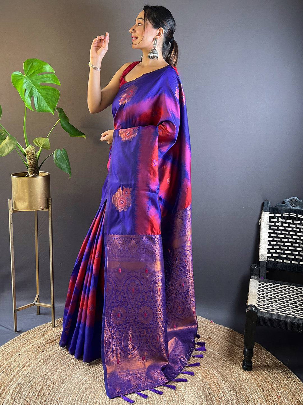 Side pose of Rose Red Tussar Silk Ikkat Weaving Saree