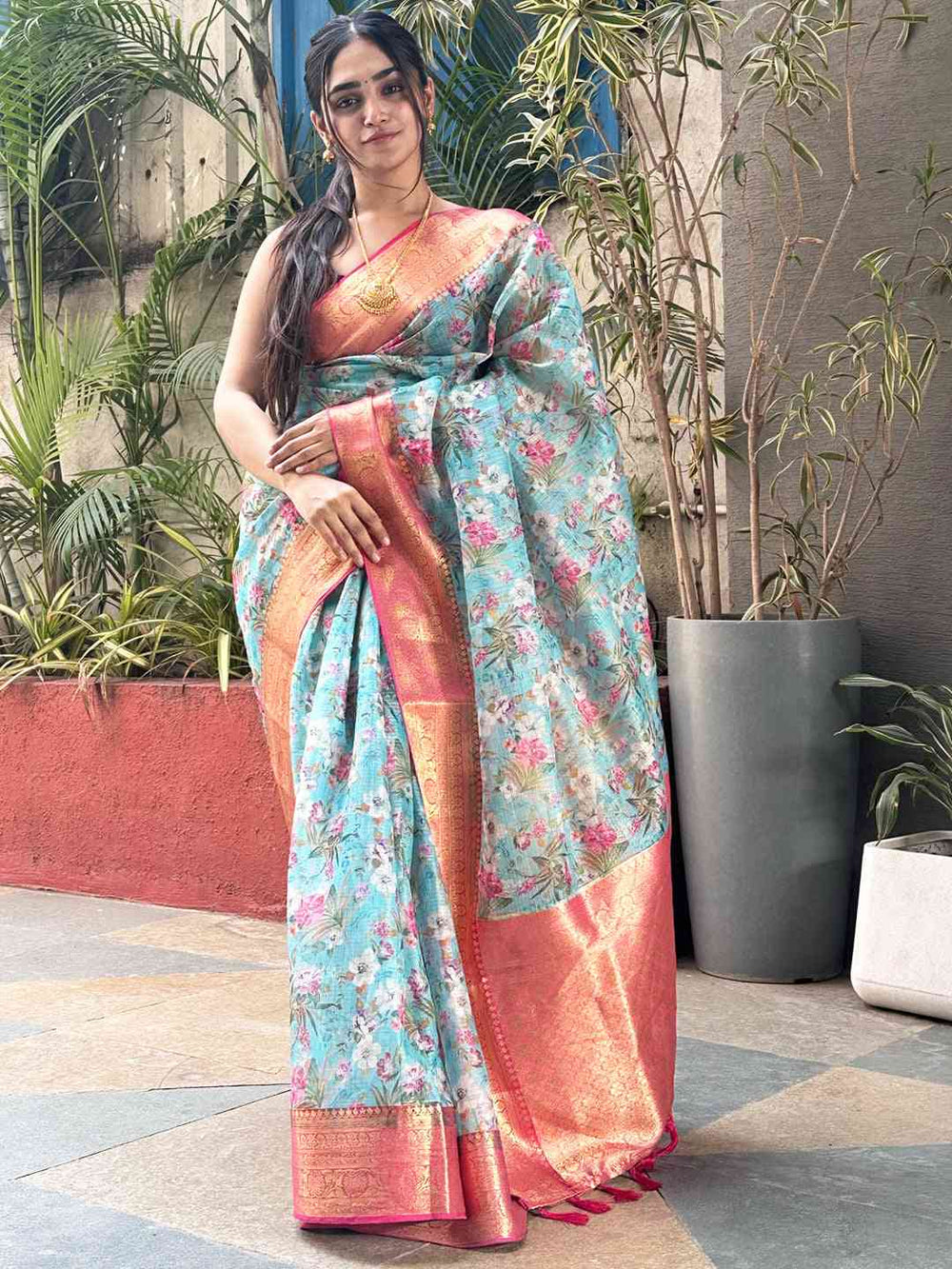 Elegant floral print Kota silk saree in turquoise