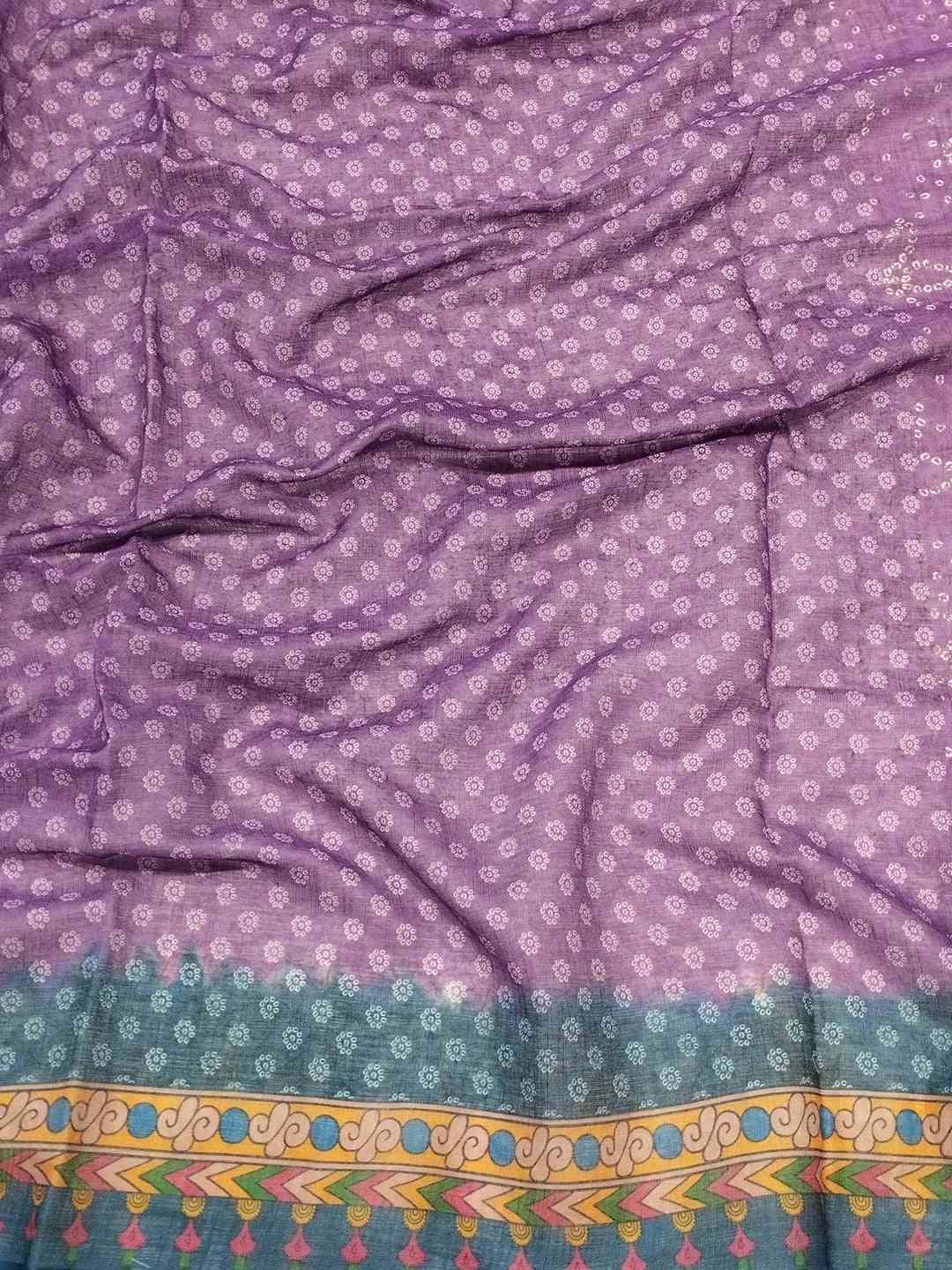 Close-up of purple linen saree with Bandhej and Kalamkari border