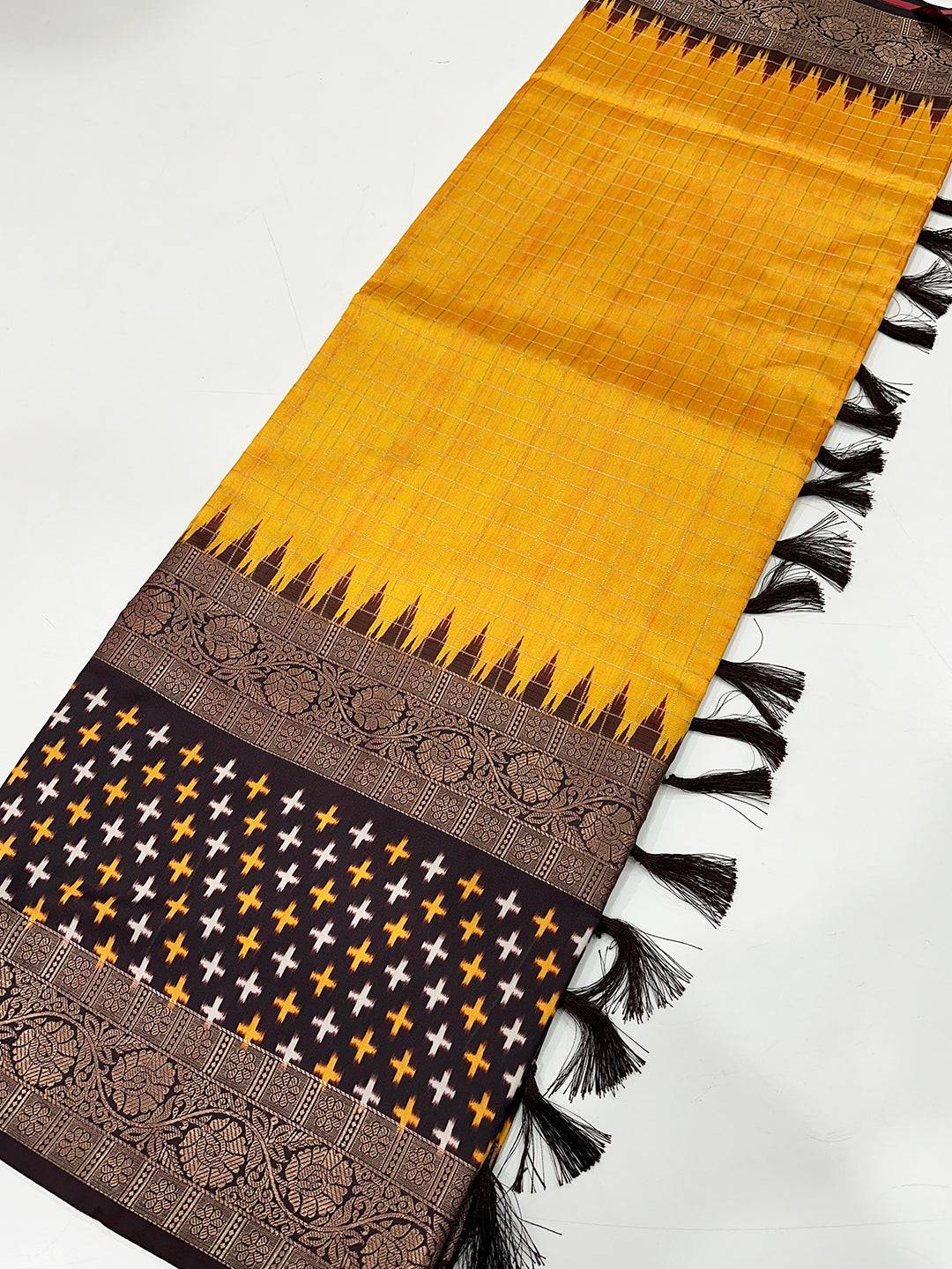 Detailed view of Yellow Chex Ikkat saree with border