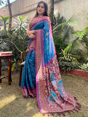 Blue designer linen saree with intricate Bandhej and Kalamkari