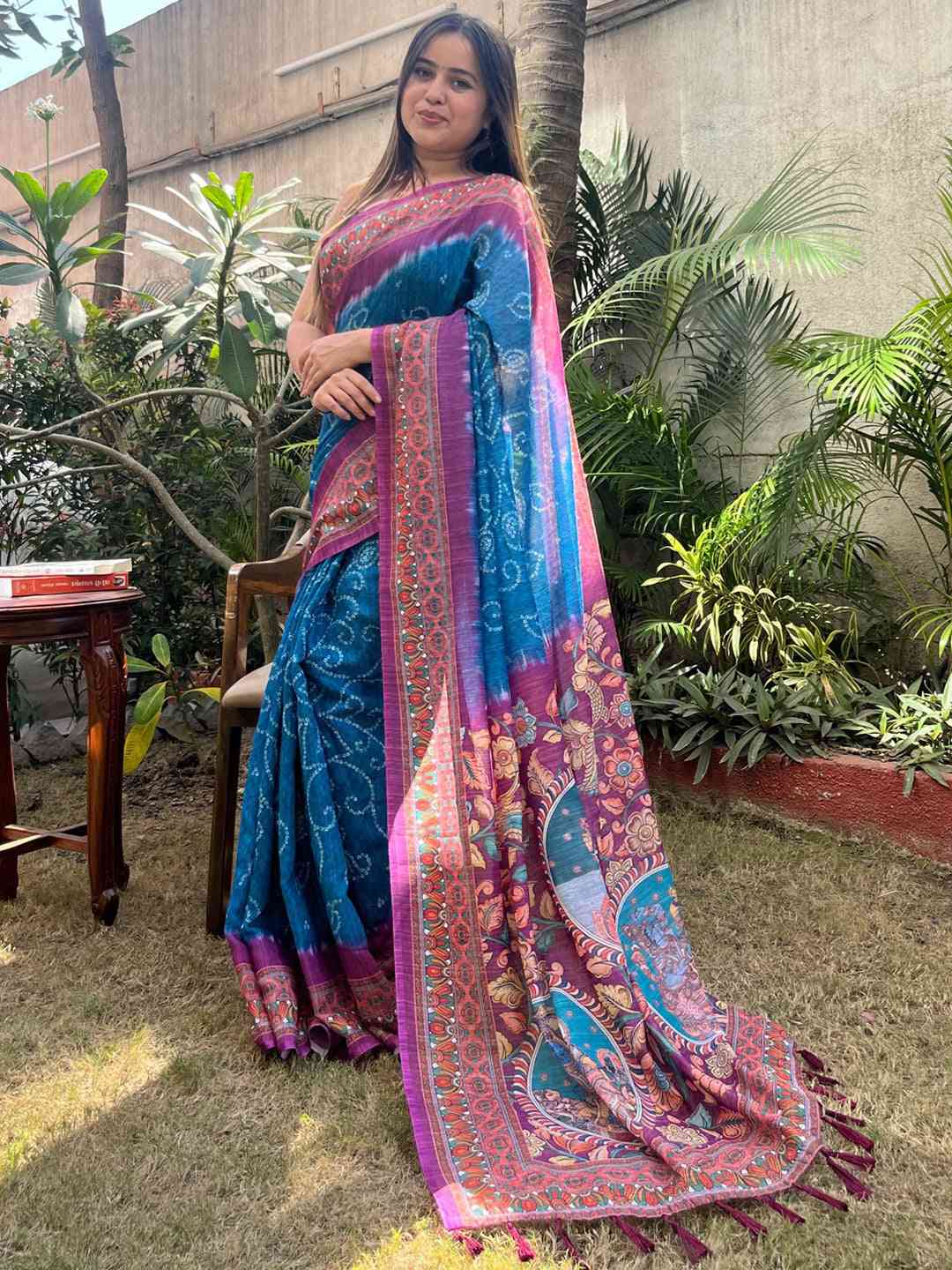 Blue designer linen saree with intricate Bandhej and Kalamkari