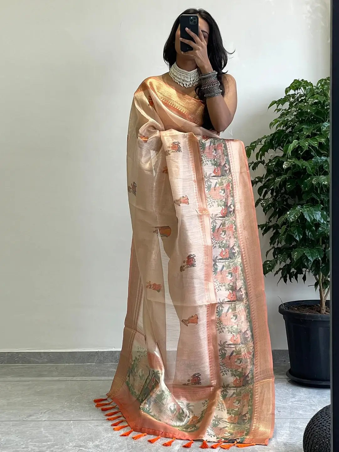 Elegant Soft Gold Zari Tissue Saree with intricate digital print.