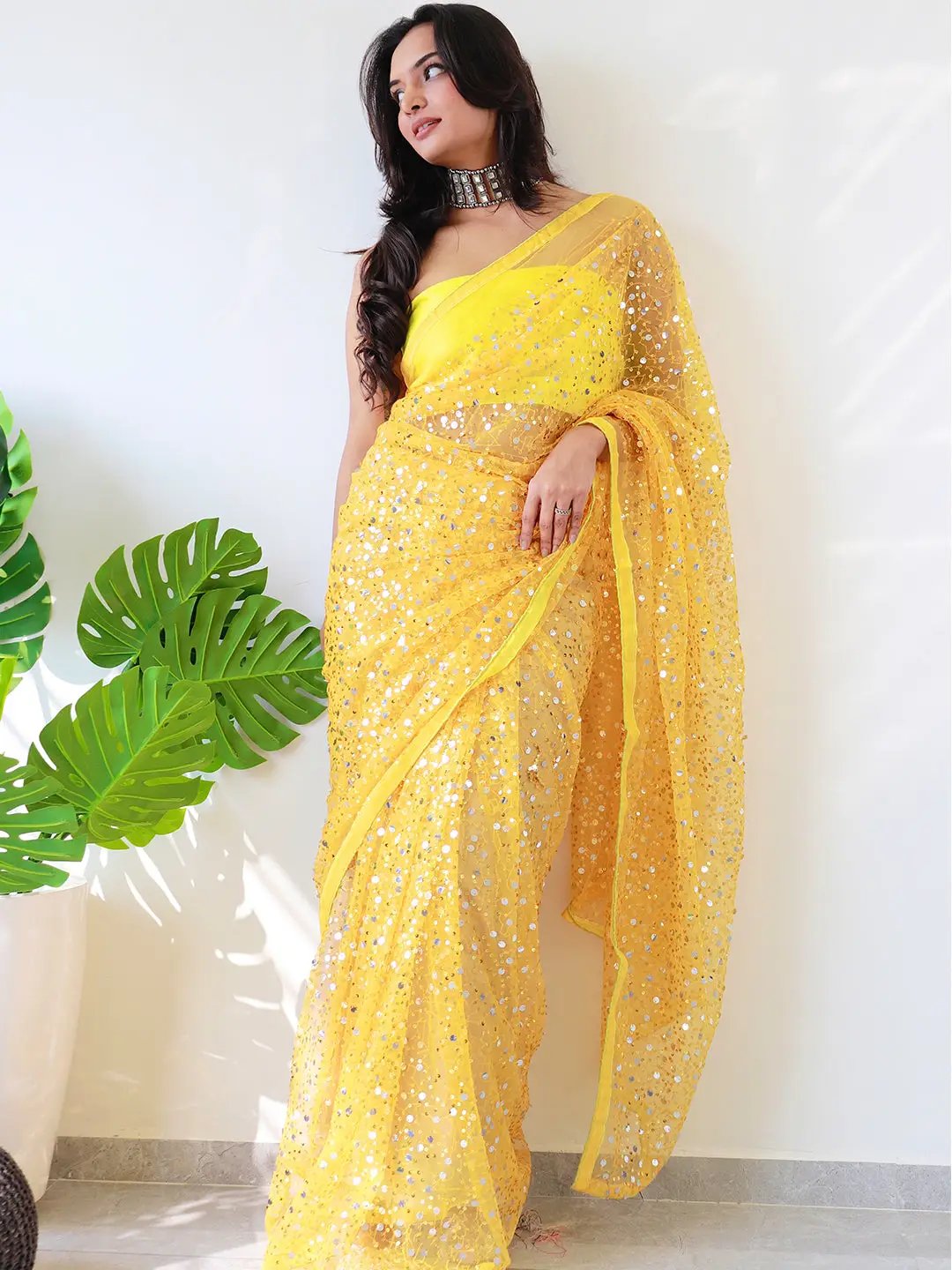 Traditional Ethnic Motif With Sequined Net Sarees 