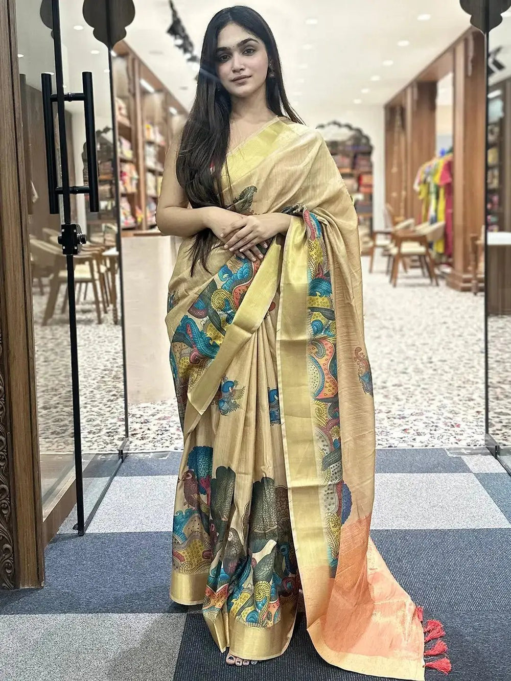 Model showcasing Pen Kalamkari Linen Tissue Soft Saree in store.
