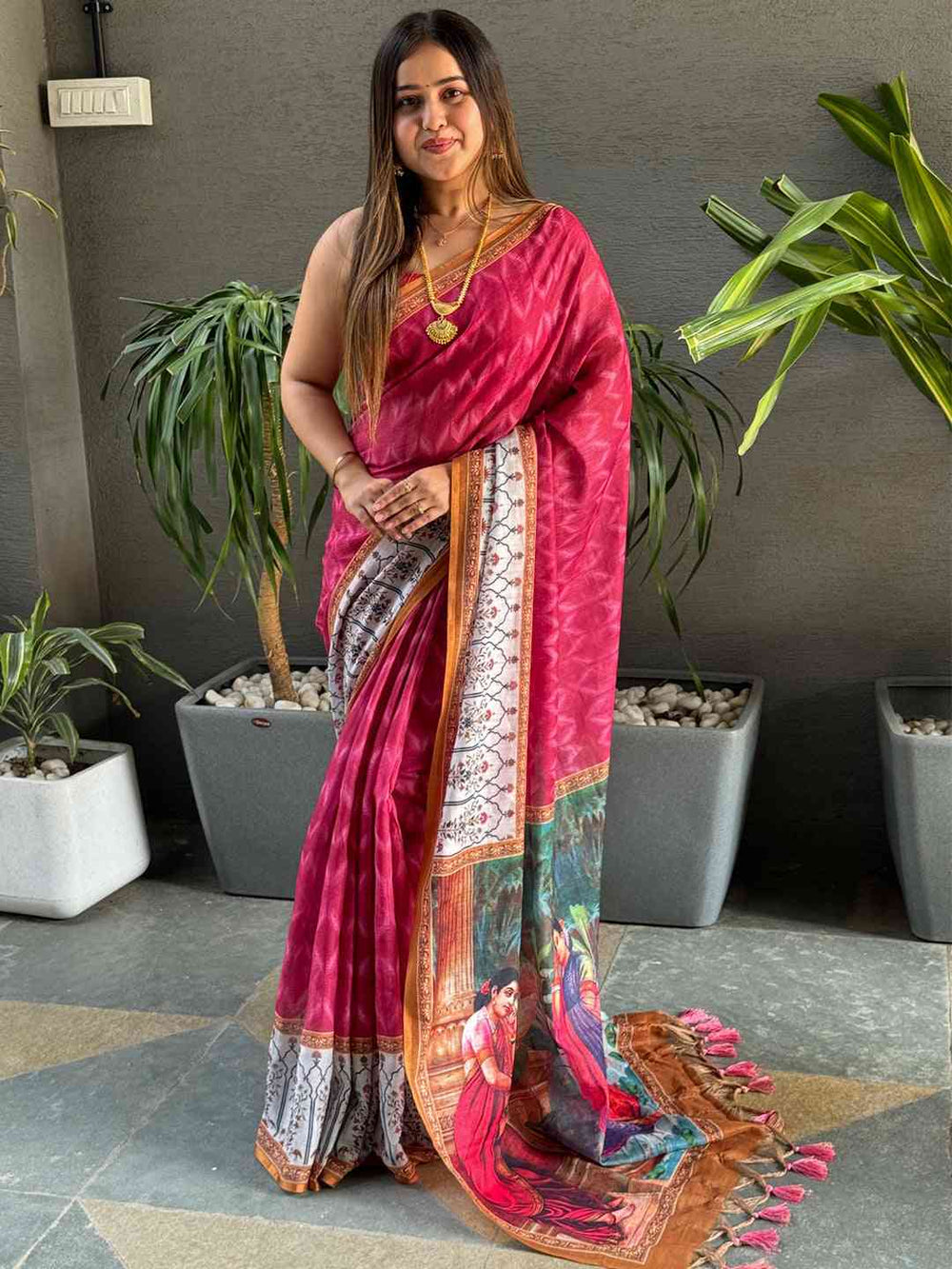Elegant Ikkat saree in rani color with Kalamkari design