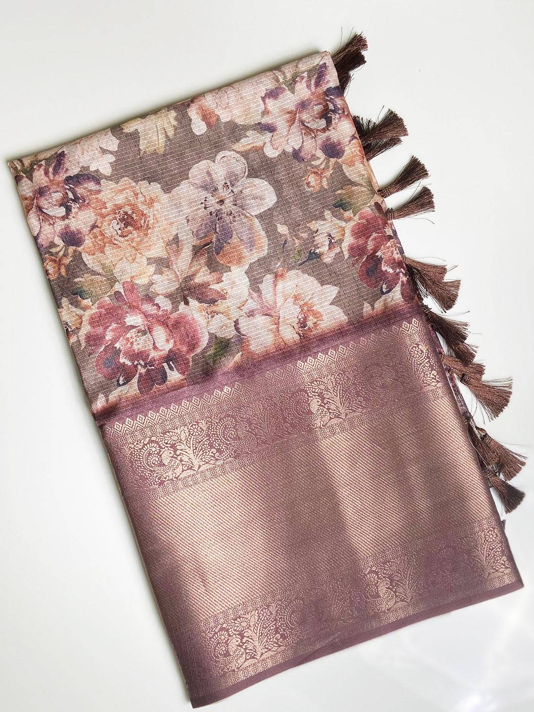 Folded Olive Kota Doriya saree with floral design and tassels