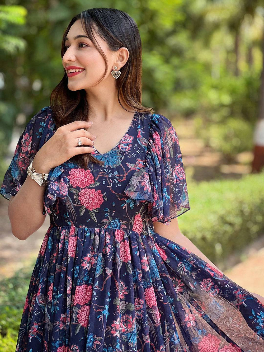 Smiling woman in Midnight Navy Floral V-Neck Dress