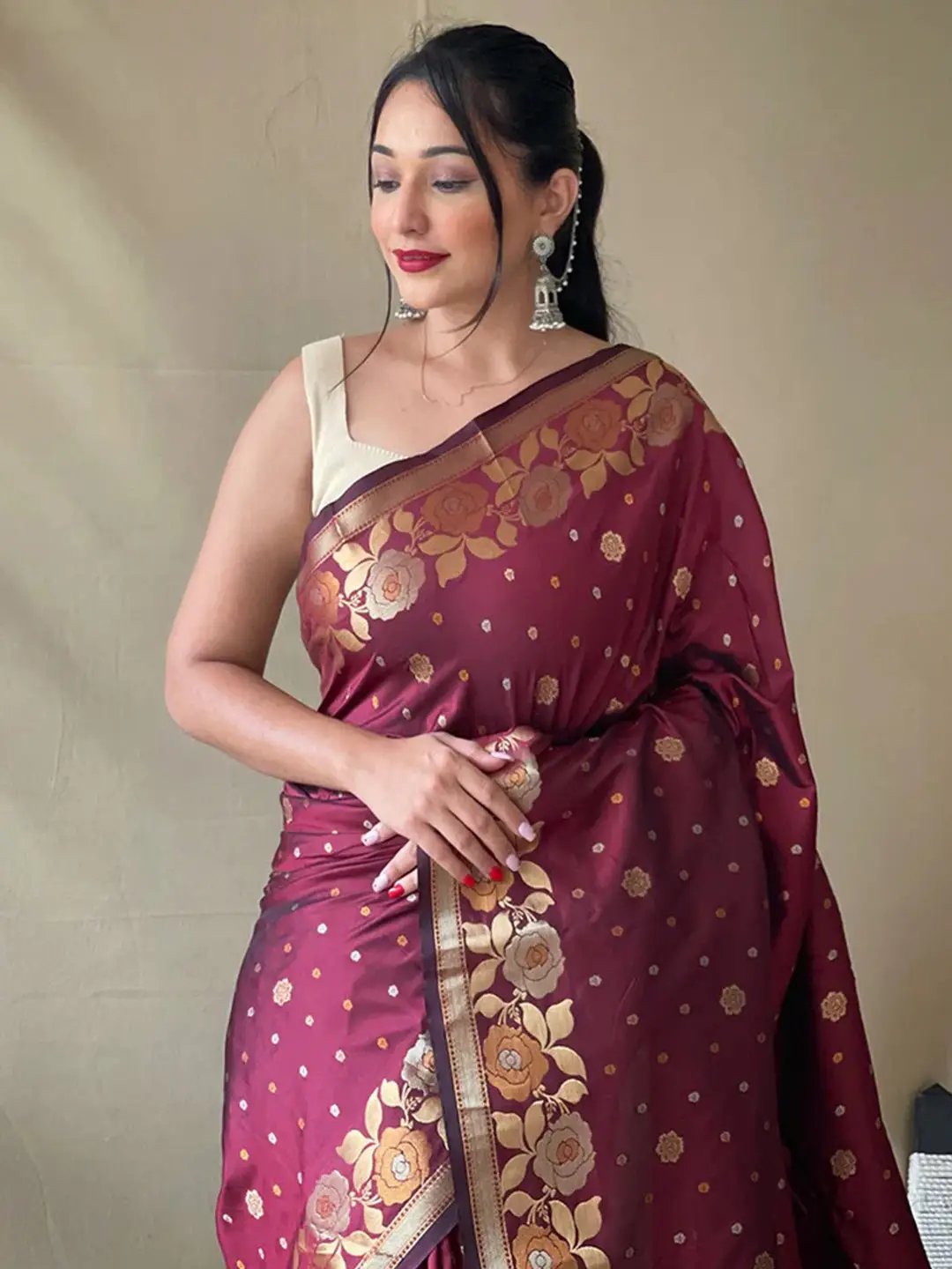 Wine Banarasi silk saree with zari floral design