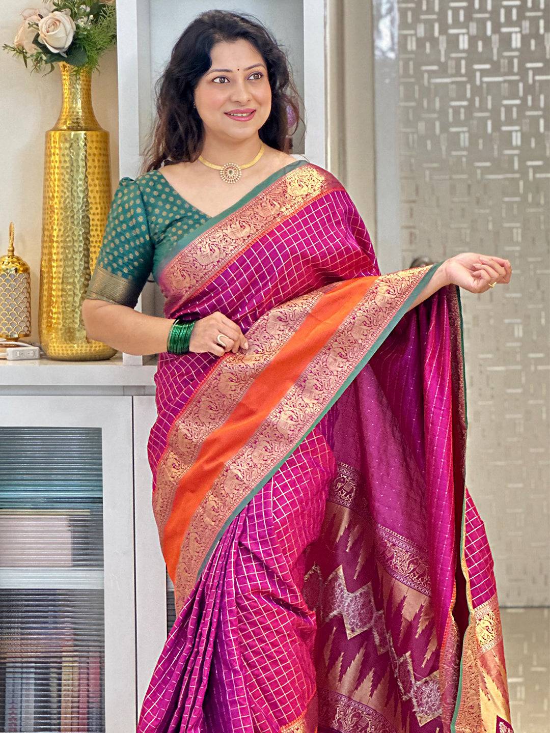 Elegant Banarasi silk saree in wine with intricate zari border