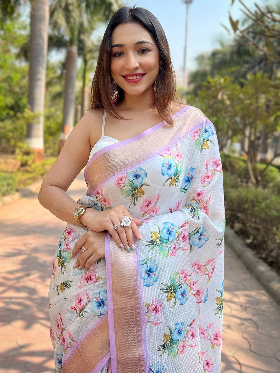 Model wearing Lavender Kota saree with floral print