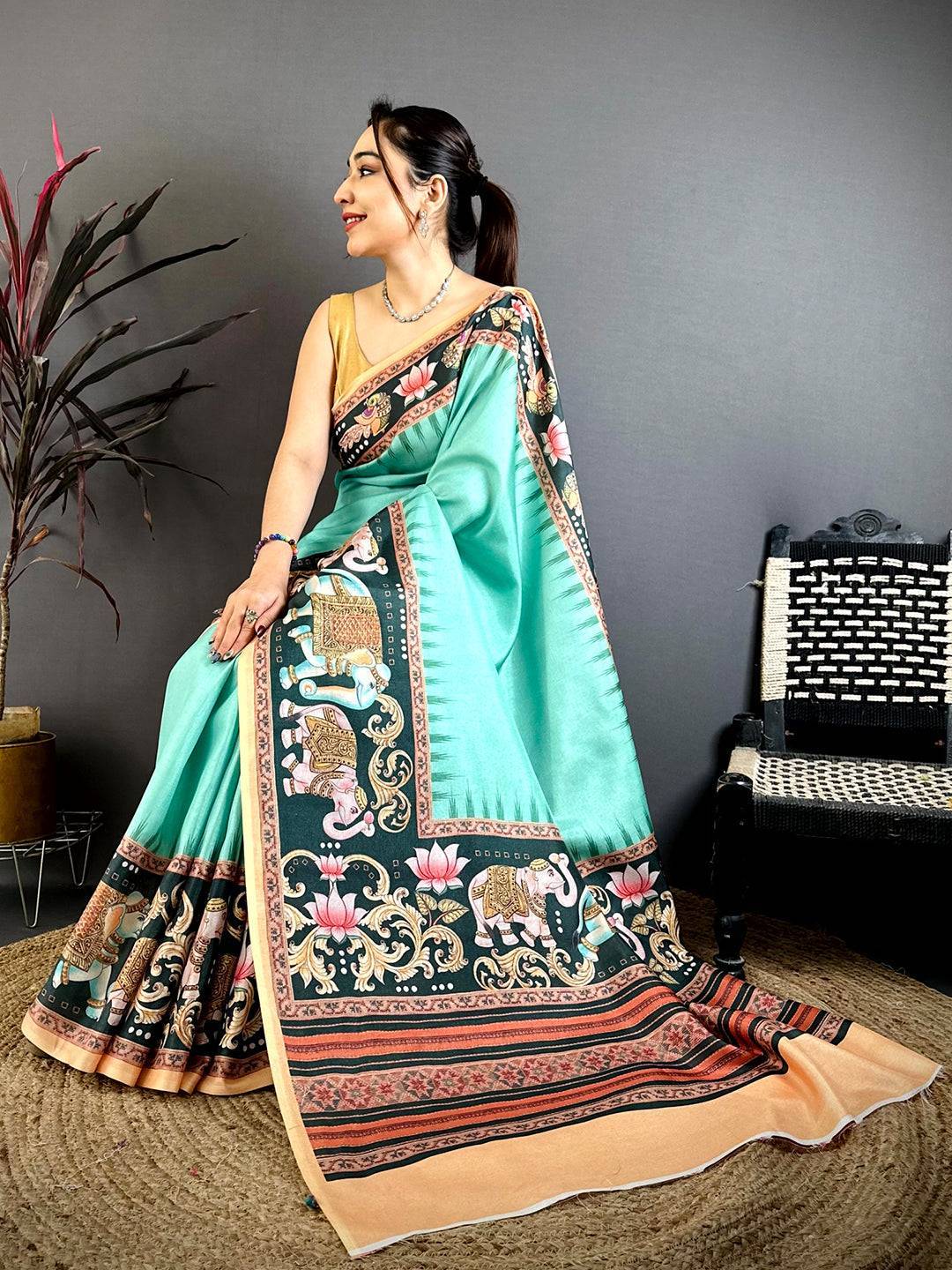 Turquoise Tanjore Elephant Tussar Saree