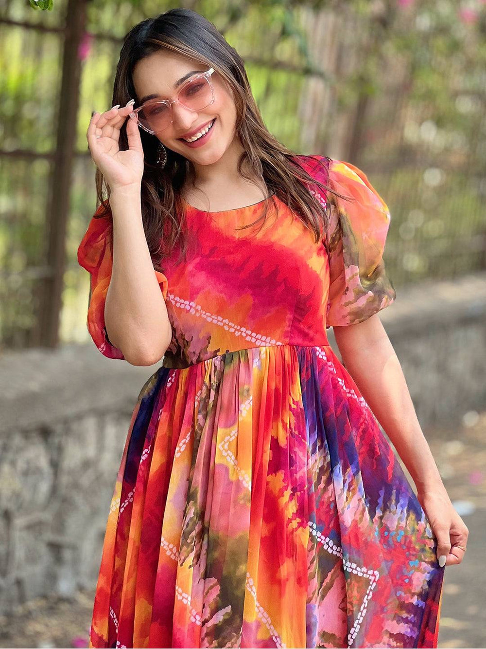 Close-up of batik bandhej dress with puff sleeves