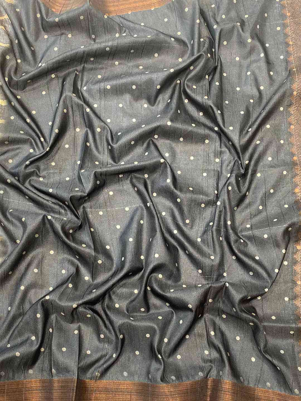 Close-up of Pure Tussar Silk Ghicha Saree fabric with dots