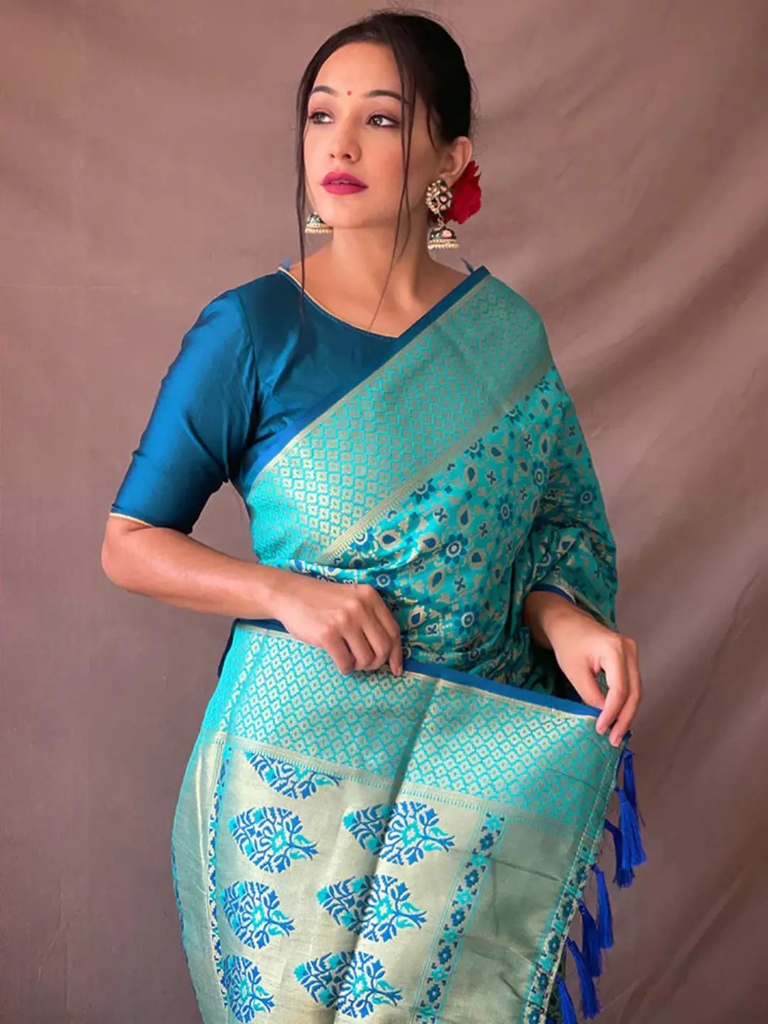 Close-up of Cerulean Blue Patola Silk Saree with Zari Details