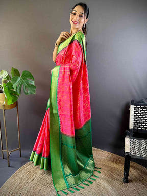 Elegant pose in blush pink Kovai Banarasi silk saree with green accents