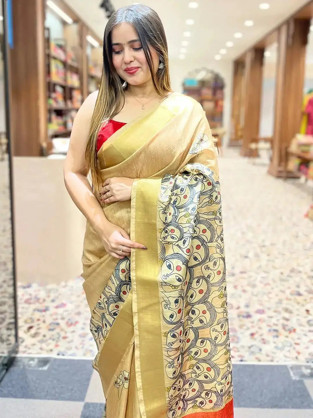 Gold Pen Kalamkari Linen Tissue Soft Saree draped elegantly.