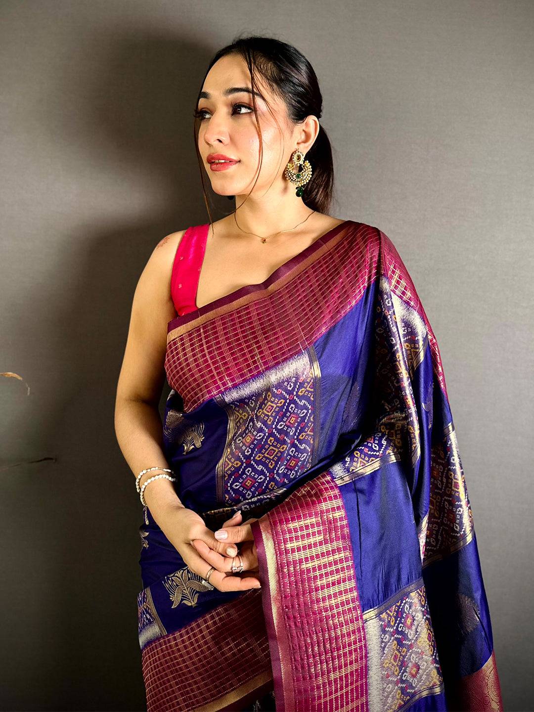 Opulent Soft Silk Patola Ikkat Pink Pallu Saree