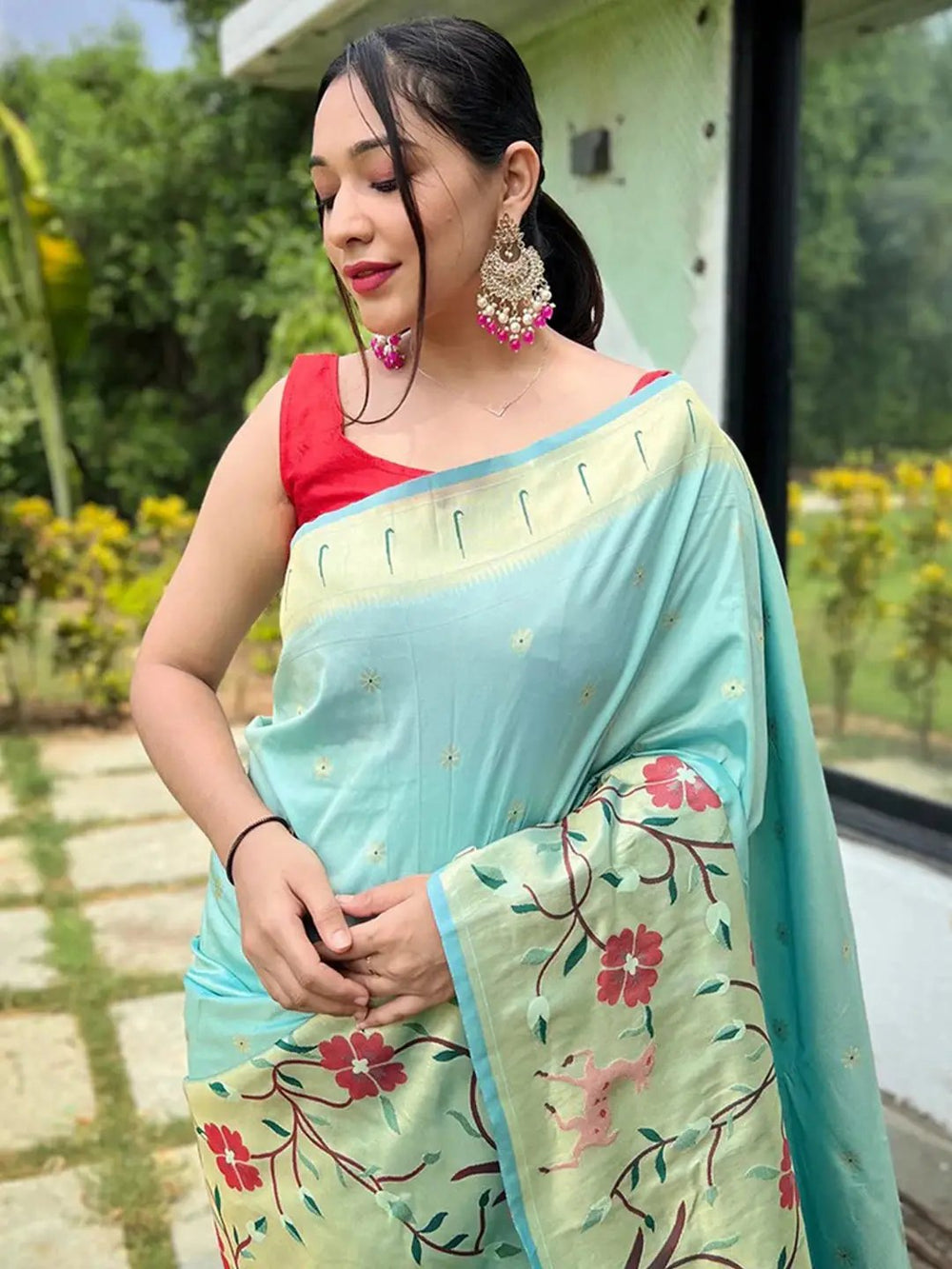 Close-up of Aqua Colour Paithani Saree, intricate floral pattern