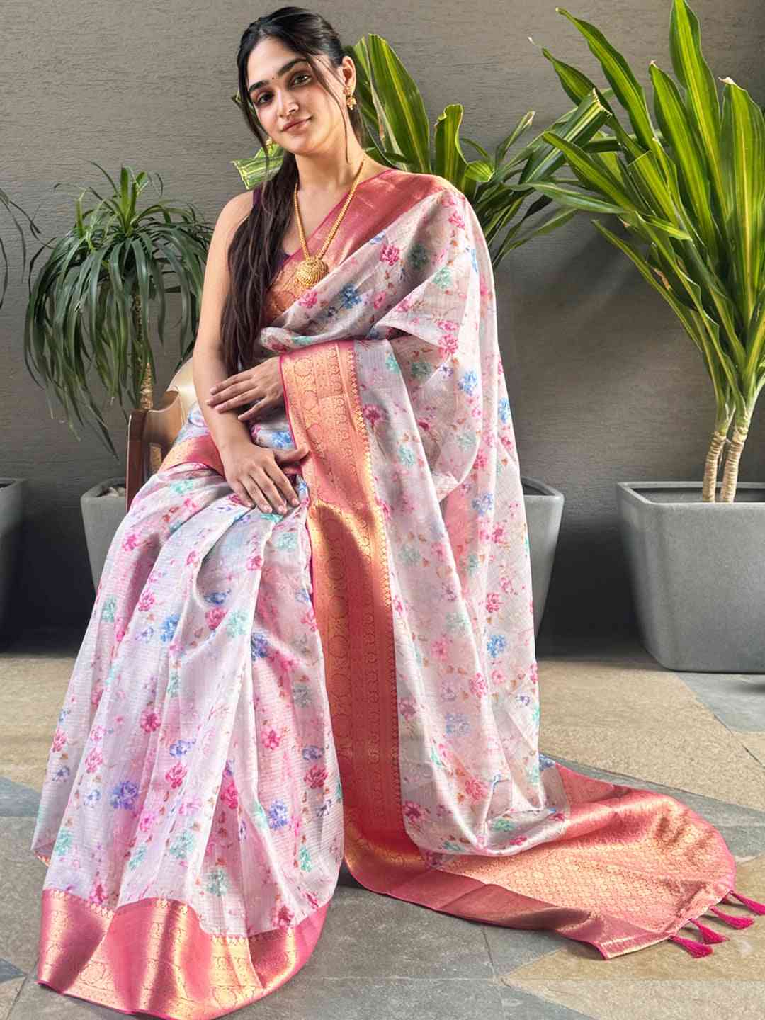Light pink digital flower print Kota silk saree draped elegantly