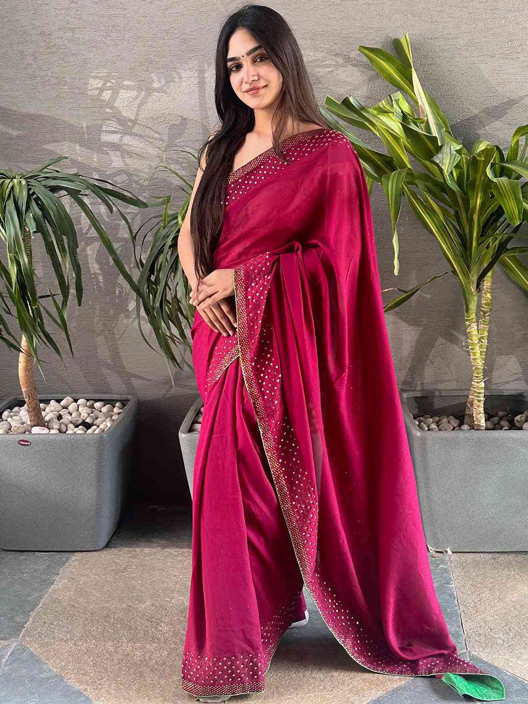 Wine Vichitra Silk Saree with Swarovski stones, model standing