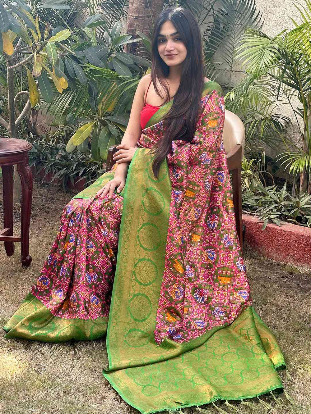 Light green Dola silk saree with intricate zari work