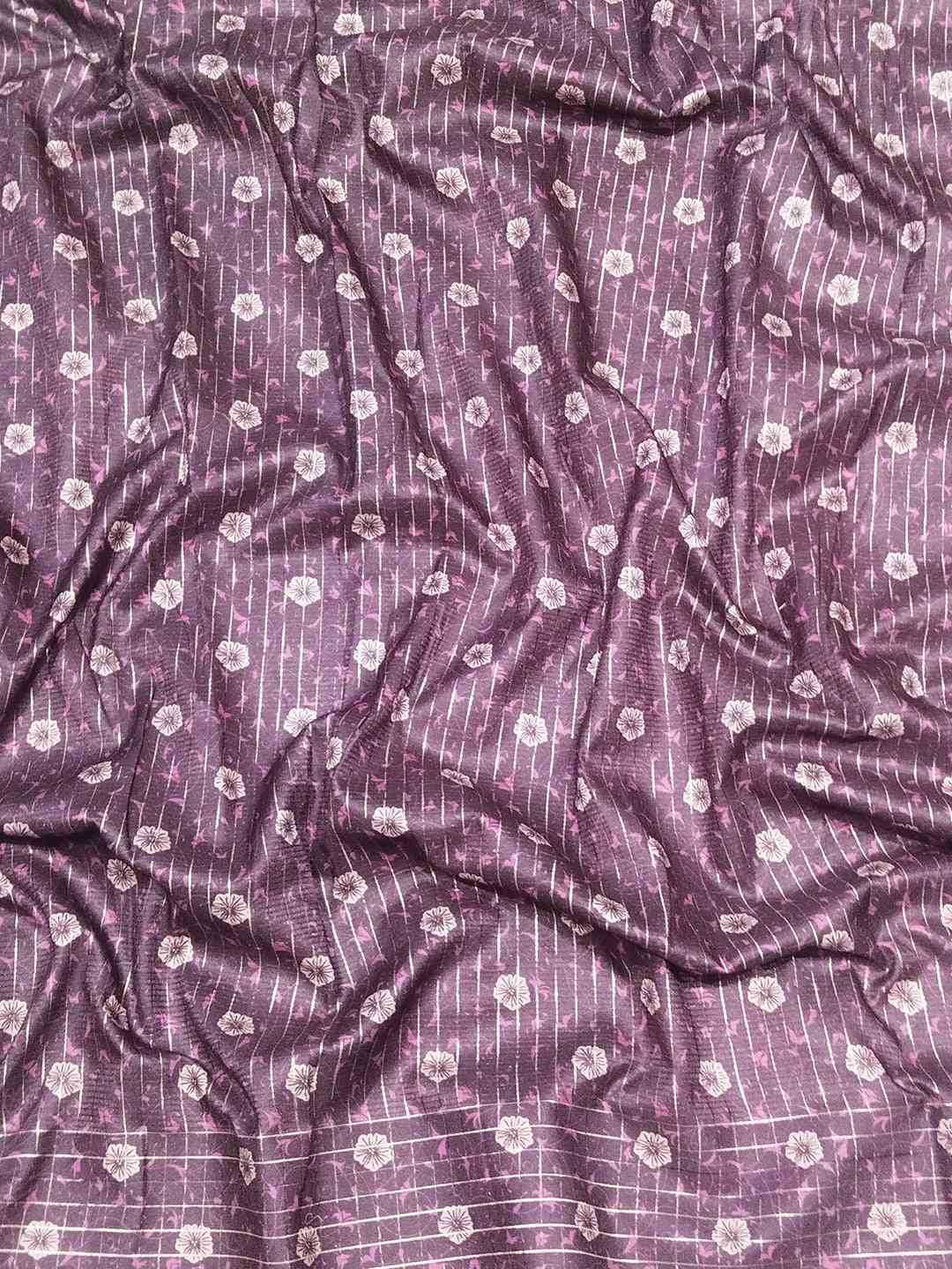 Fabric detail of pink Satin Kota Doria Saree with patterns