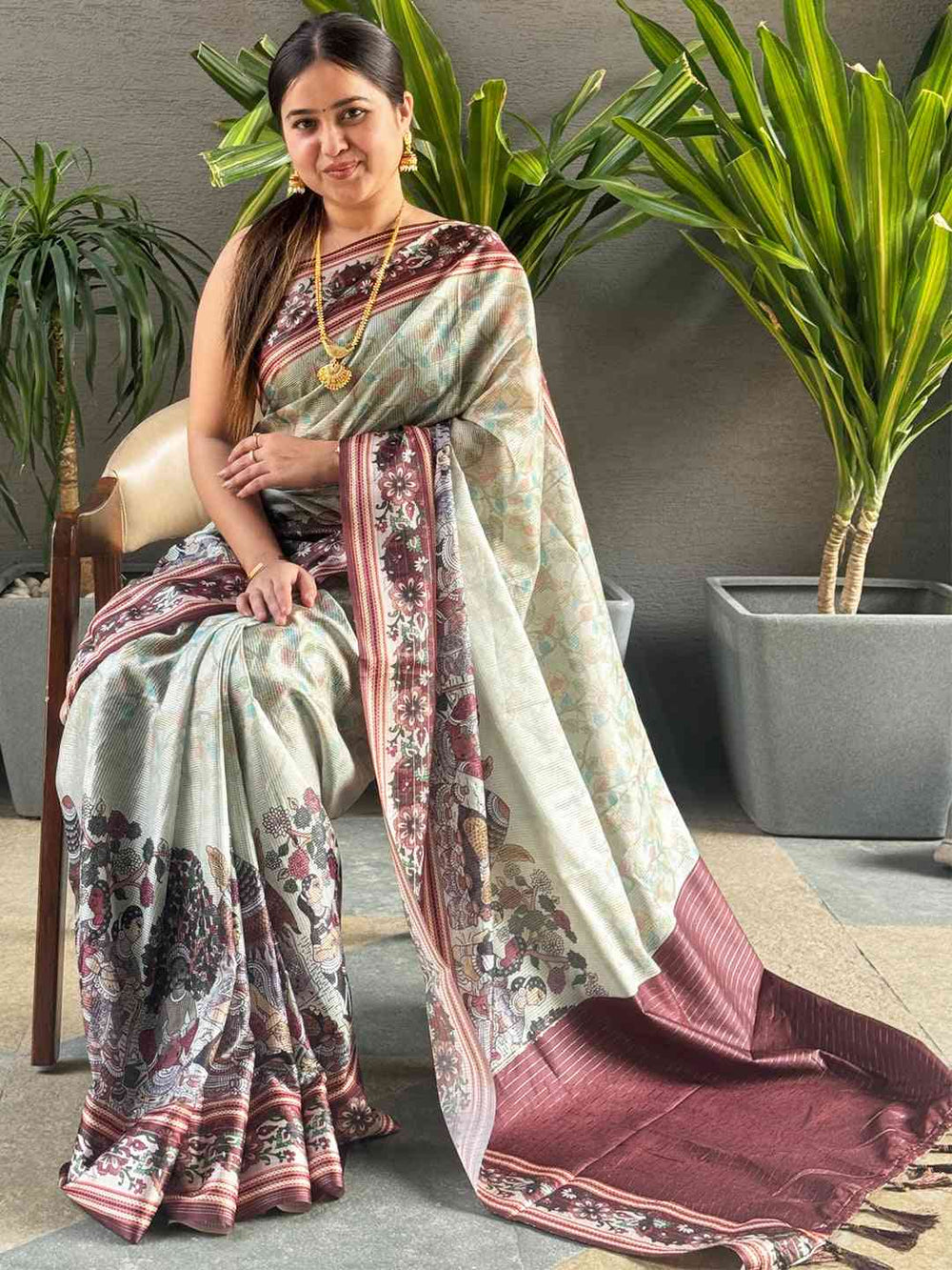 Pista Colour Satin Kota Doria Saree with Zari Pallu, seated view