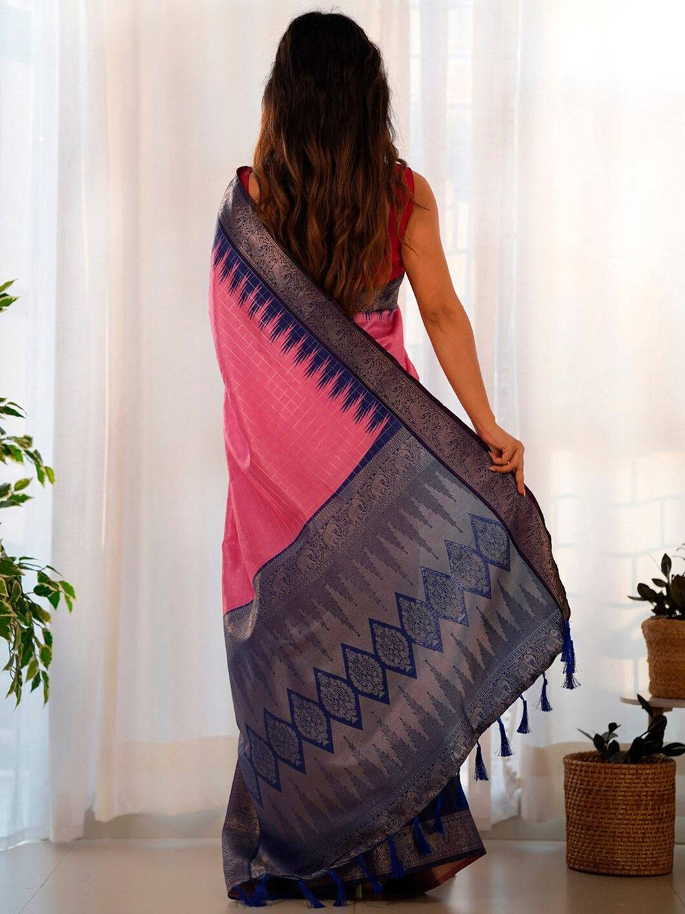Back view of pink Banarasi Gadwal saree with intricate blue border